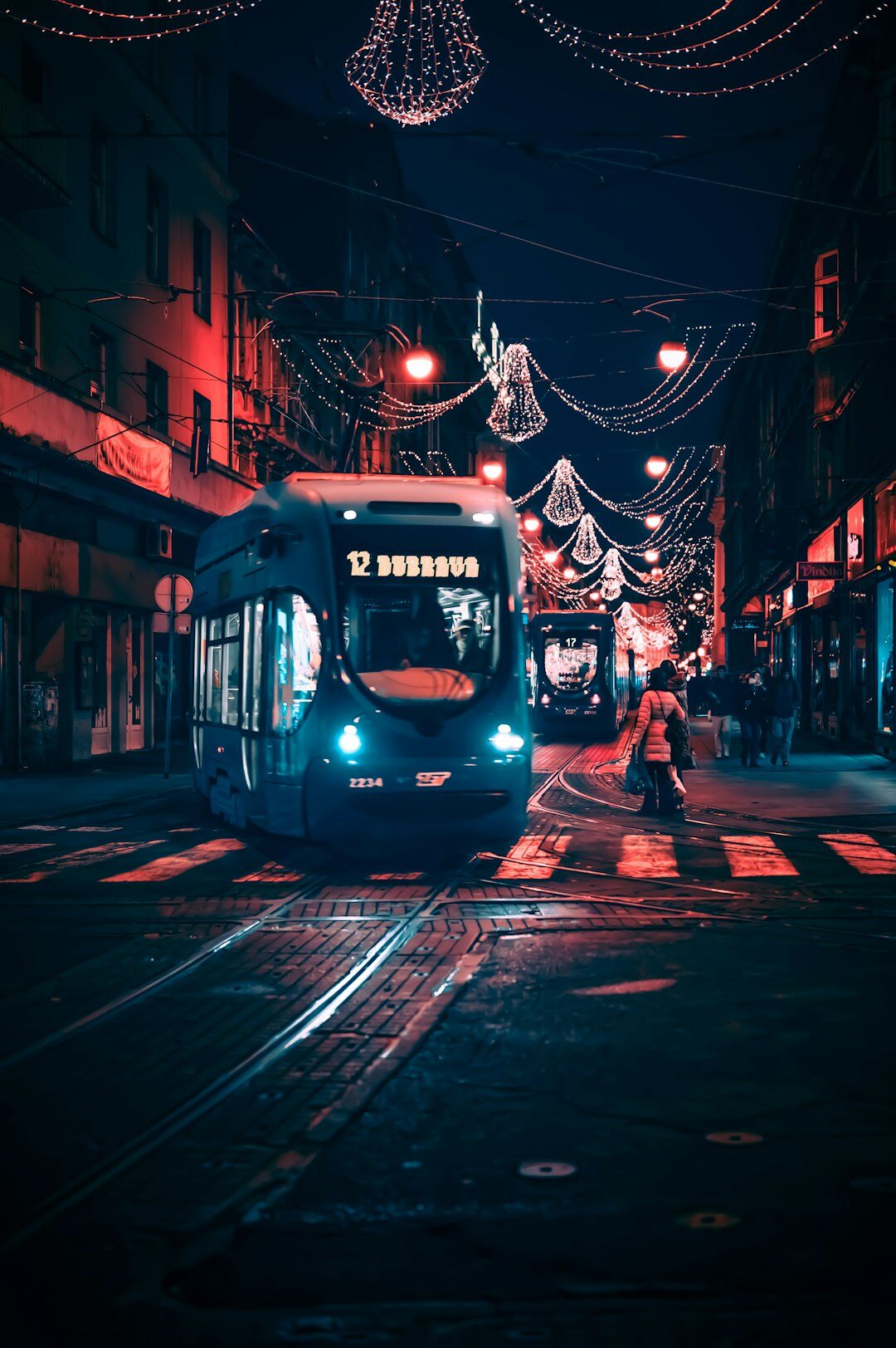 Dark moody book cover illustration of a foggy Zagreb street at night